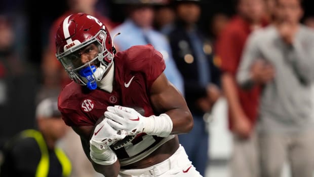 Dec 2, 2023; Atlanta, GA, USA; Alabama Crimson Tide defensive back Caleb Downs (2) catches the ball for a punt return against the Georgia Bulldogs during the first half in the SEC Championship game at Mercedes-Benz Stadium. Mandatory Credit: Dale Zanine-USA TODAY Sports  